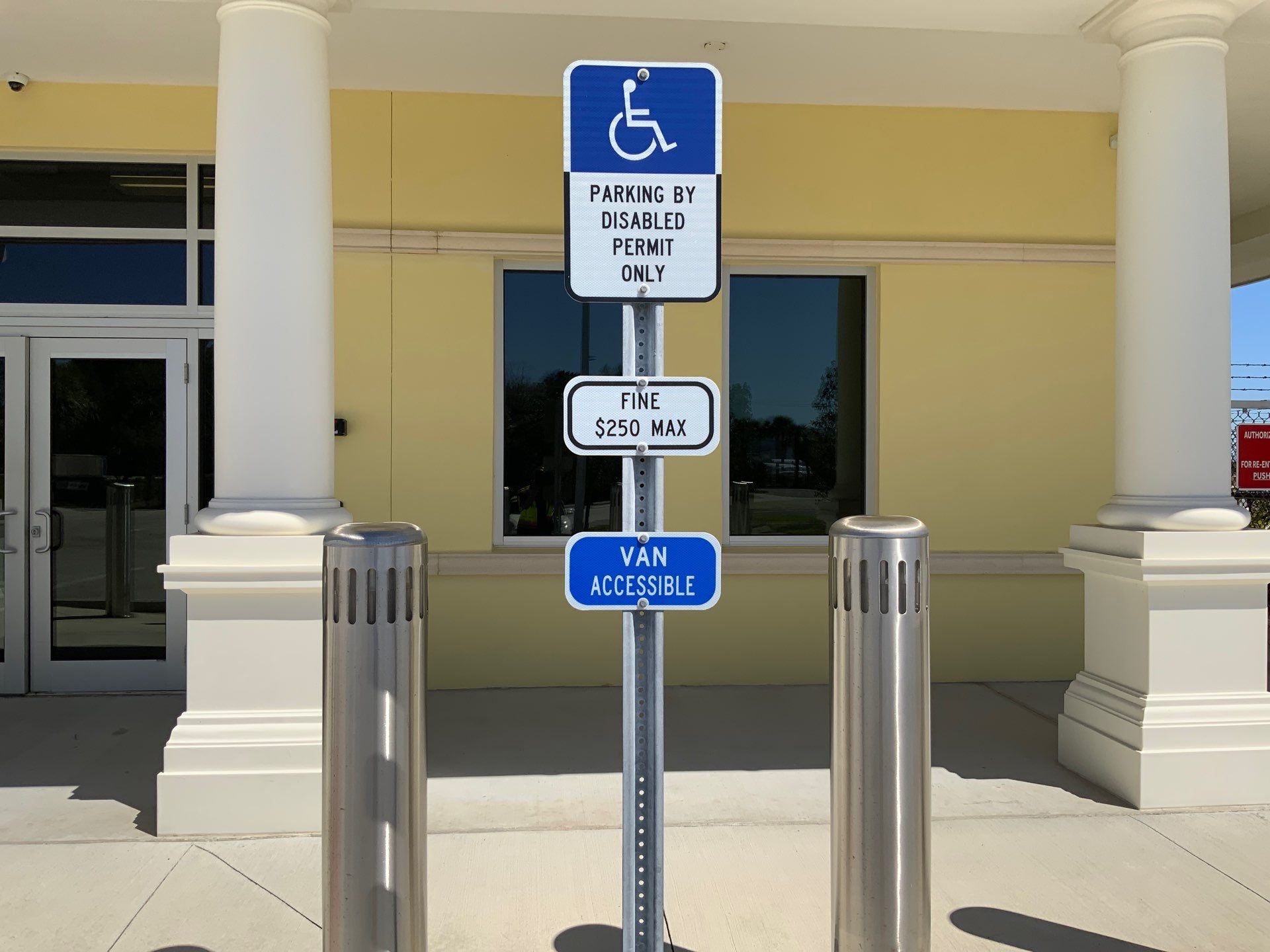 Parking signs, parking lot lights, Brister Signs